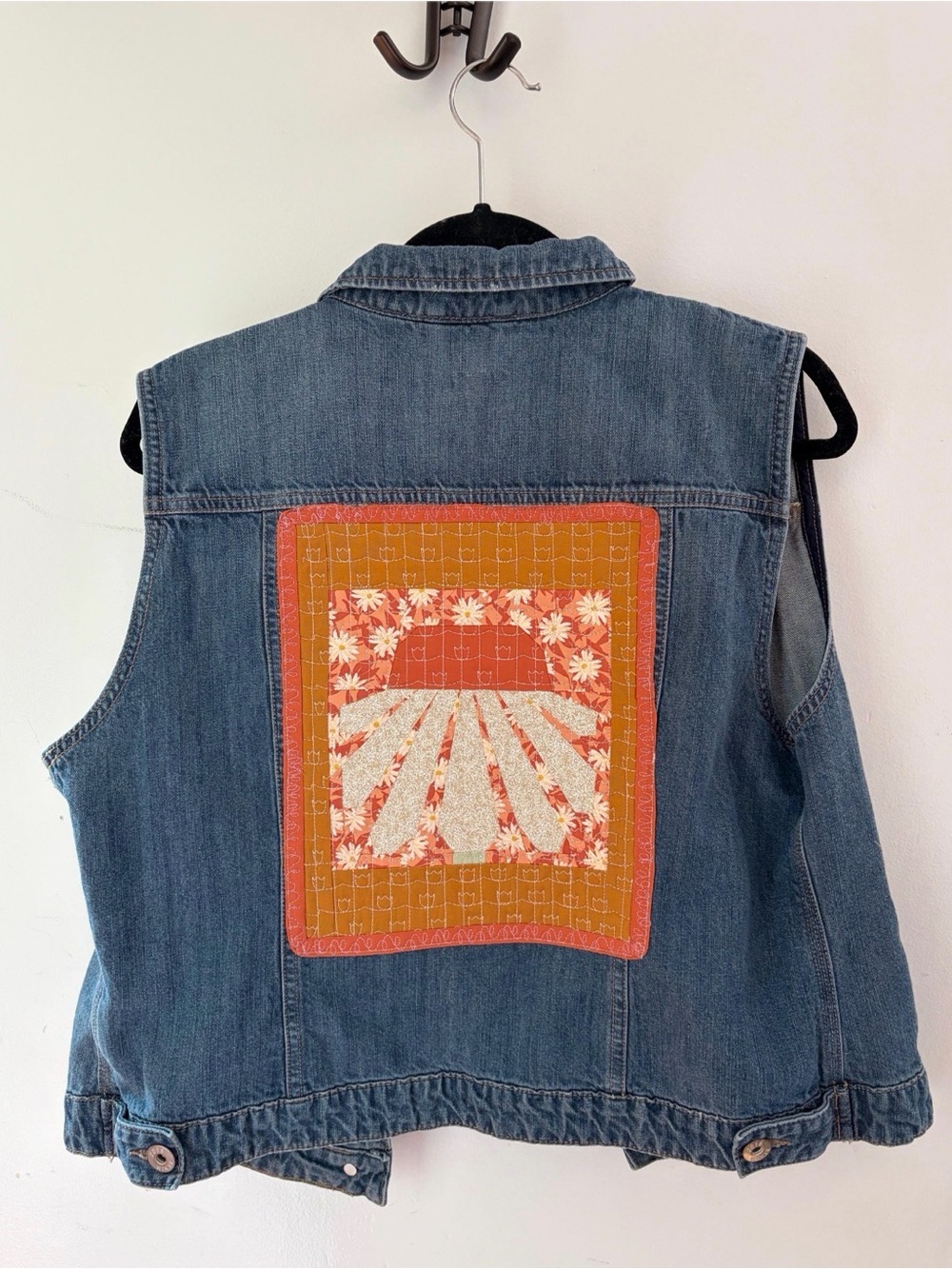 Upcycled Jean vest with a quilted coneflower on the back size XL